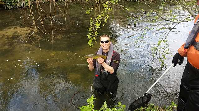 Stuart Keable, Fisheries Officer with brown trout